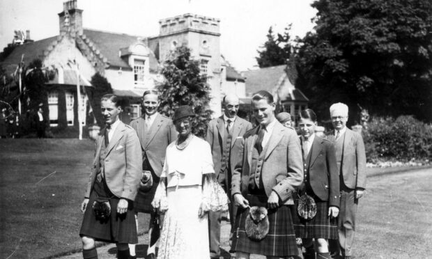 Lady MacRobert at Alastrean House with sons (left to right) Roderic, Alasdair and Iain.