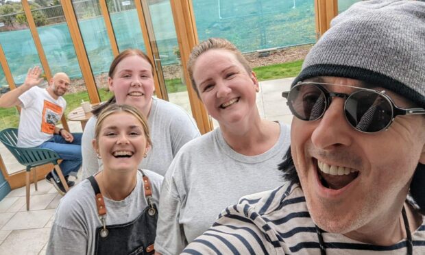 Alan Cumming took a selfie with some of the cafe's staff. Supplied by Trellis Cafe.