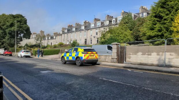 Police at Springbank Terrace at the junction with Crown Street on Wednesday. Photo: DC Thomson