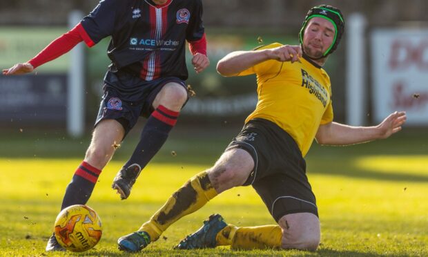 Paul Macleod, right, in action for Nairn during his first spell with the club.