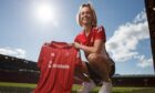 Aberdeen's new signing Nadine Hanssen with the women's home shirt. (Image: Aberdeen FC)