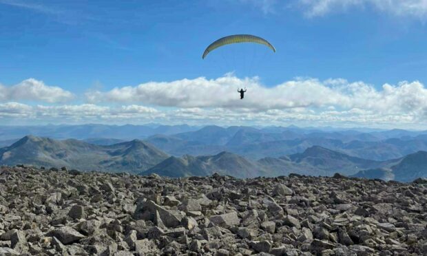 A paraglider jumped from the top of Ben Nevis. Supplied by Deadline News.