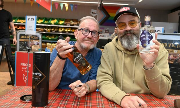 Ford Kiernan and Greg Hemphill signing bottles in Aberdeen earlier this year. Image: Paul Glendell / DC Thomson