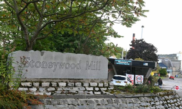 Image of Stoneywood Mill sign outside the site.
