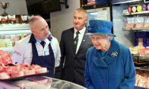 Her Majesty at HM Sheridan butchers in September 2016. The queen is with Barry Florence, left, and John Sinclair, right.