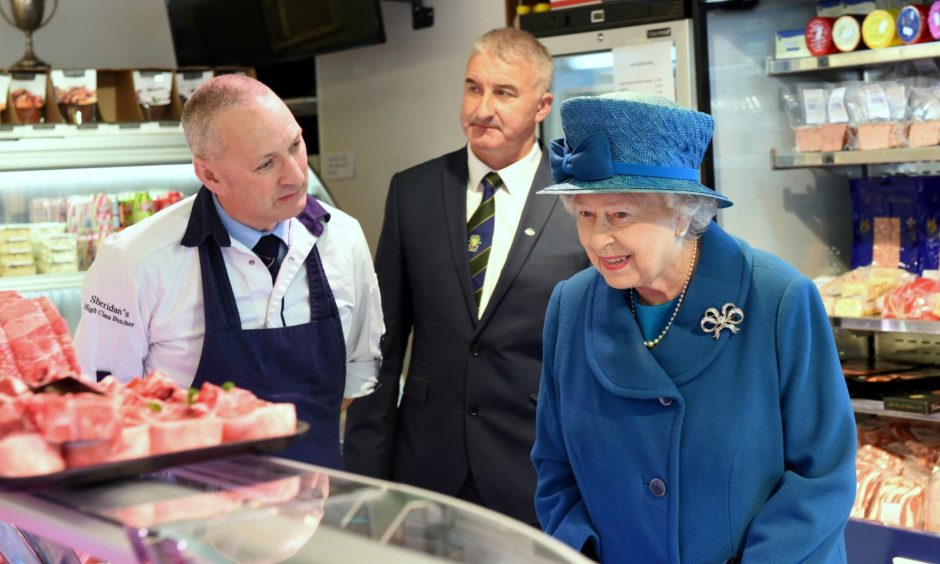 The Queen at HM Sheridan butchers in September 2016.
