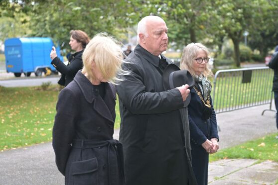 Convener Bill Lobban, provost Glynis Sinclair and council chief executive Donna Manson at the garden of remembrance in Inverness. Picture by Sandy McCook