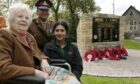 Isobel Harling of Kingussie, who has looked after the local graves, photographed with Warrant Officer Ashok Chauhan of the British Army and Sehar Sardar, representing the Commonwwealth War Graves Commission. Picture by Sandy McCook