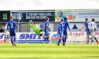 Russell Dingwall makes it 1-0 to Elgin City against Peterhead.