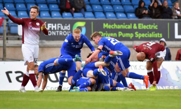 Peterhead's Conor O'Keefe celebrates his winning goal against Kelty Hearts.