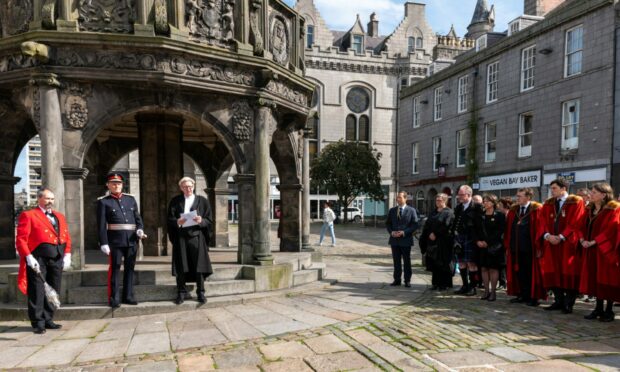 Sheriff Philip Mann (right) with Lord Lieutenant of Aberdeen David Cameron at the proclamation of King Charles III. The ceremony in the Castlegate took place within an hour of the Queen's cortege passing through the city. Picture by Jasperimage.