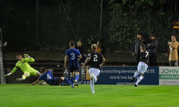 Darren Christie, right, scores Pollok's second goal against Huntly