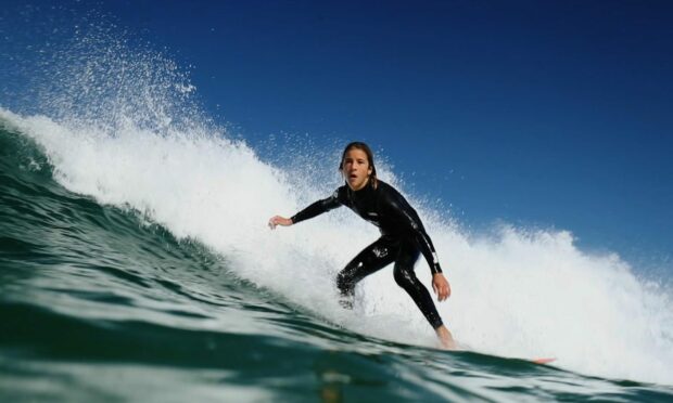 Image still of Ben Larg from Martyn Robertson's surfing documentary, Ride the Wave