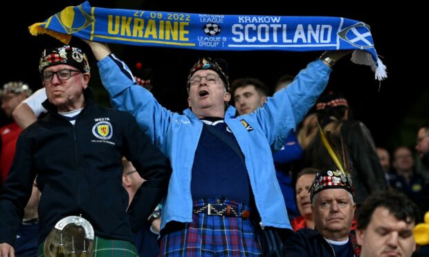 Scotland fans in the stands show their support prior to the match at the Stadion Cracovii in Krakow, Poland.