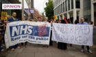 Healthcare professionals, including doctors and nurses, protest over long hours and low pay in London (Photo: Hesther Ng/SOPA Images/Shutterstock)