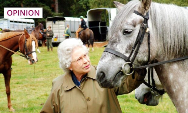 The late Queen with a horse on the Balmoral estate in 2001 (Photo: Rhuary Grant/Shutterstock)
