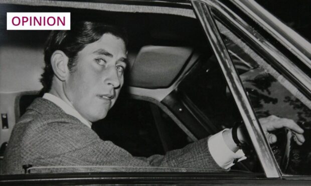 King Charles driving whilst in his final year at Gordonstoun School, in 1967 (Photo: Peter Jolly/Shutterstock)