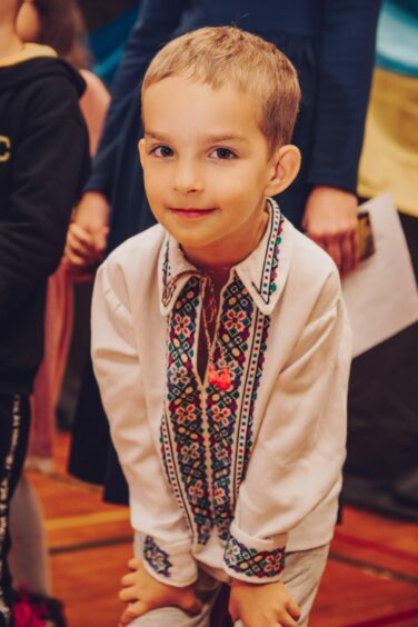 A pupil of Aberdeen Ukrainian school captured wearing his traditional Ukrainian clothing.