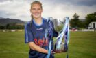 Badenoch captain Kirsty Deans with the Valerie Fraser Cup.