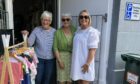 Volunteer Lottie and shop assistants Thelma and Lucy are excited for the new shop to open. Image: Highland Hospice.