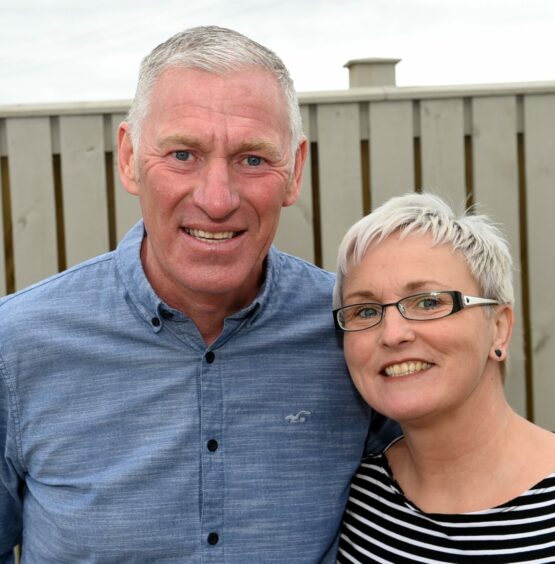 Malcolm and Tracy Steele smiling at the camera