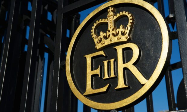 The Queen's insignia appears across countless official UK buildings, documents and other items. Photo: Shutterstock