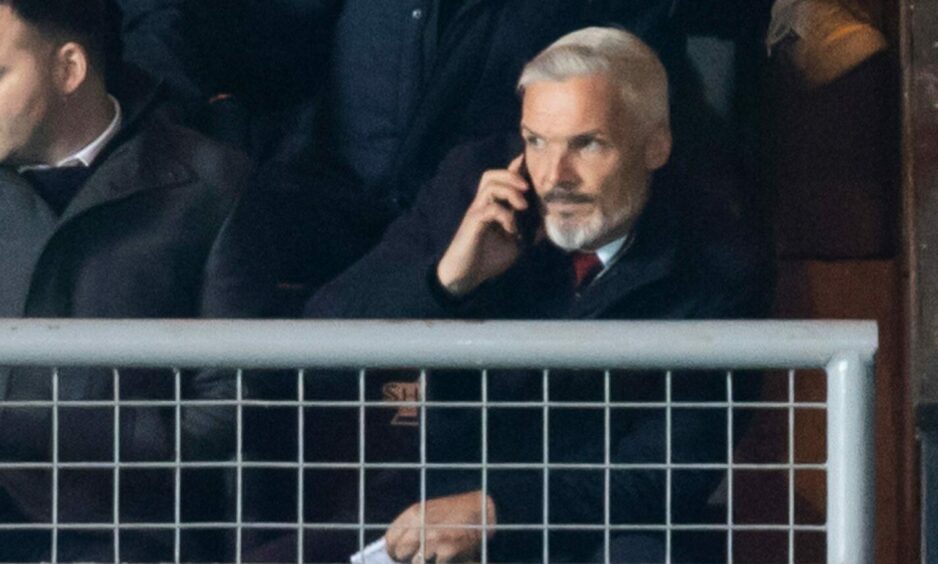 Aberdeen manager Jim Goodwin in the stands at Tannadice. Image: Stephen Dobson/ProSports/Shutterstock (13449053ci)
