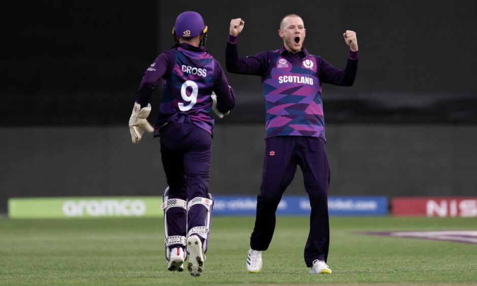 Aberdonian Michael Leask celebrates the wicket of West Indies' Rovman Powell. Image: Photo by Izhar Ahmed Khan/Shutterstock (13471198ai)