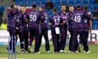 Scotland celebrate victory over West Indies at the T20 Cricket World Cup in 2022. Image: Izhar Ahmed Khan/Shutterstock (13471198ar)