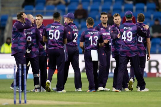 Scotland celebrate victory over West Indies at the T20 Cricket World Cup in 2022. Image: Izhar Ahmed Khan/Shutterstock (13471198ar)