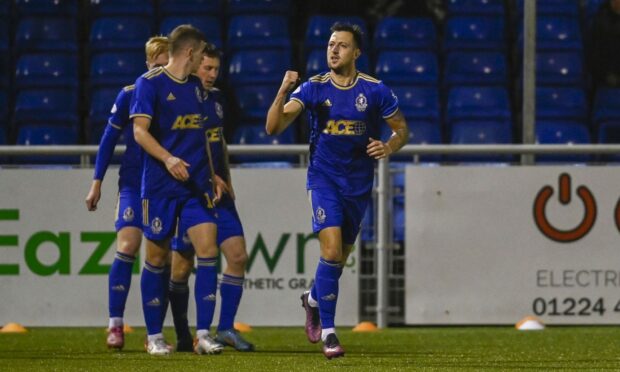 Cove Rangers midfielder Connor Scully celebrates his brace against Dundee. Image: SNS
