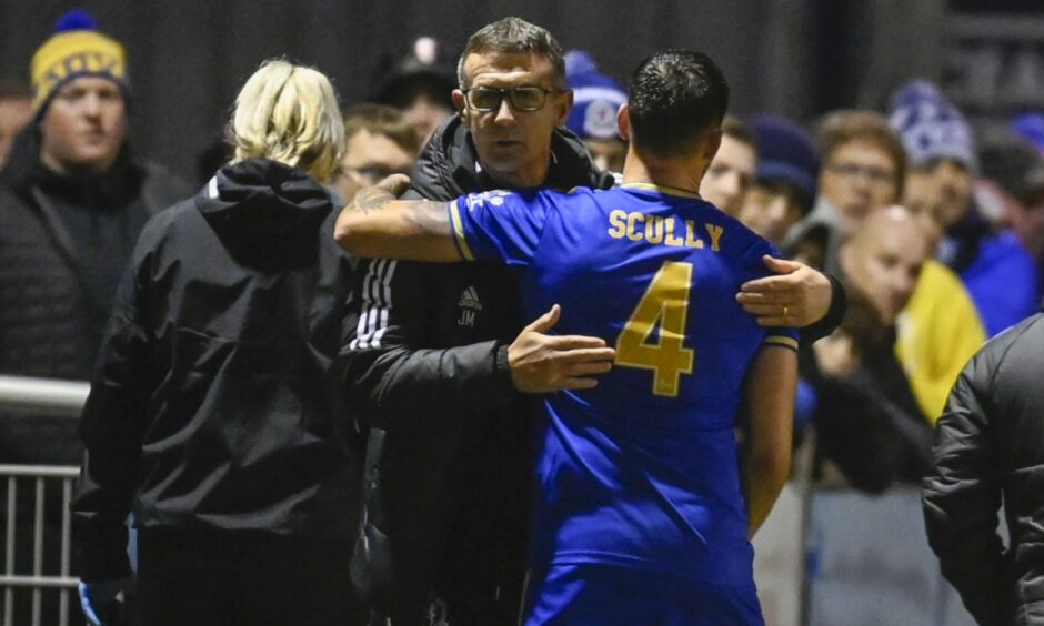 Cove Rangers manager Jim McIntyre and Connor Scully during the win over Dundee. Image: SNS
