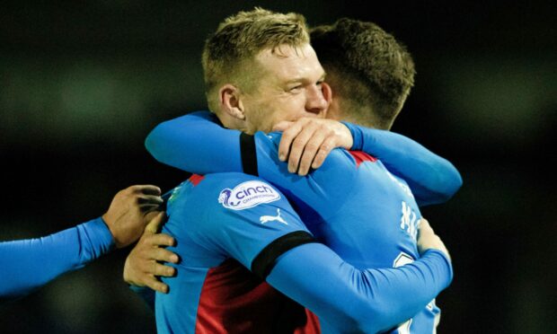 Billy Mckay celebrates after scoring the Caley Thistle winner against Partick Thistle. Image: SNS