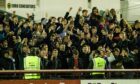 Caley Jags fans celebrate a Billy Mckay goal from the West Enclosure last season. Image: Craig Brown/SNS Group