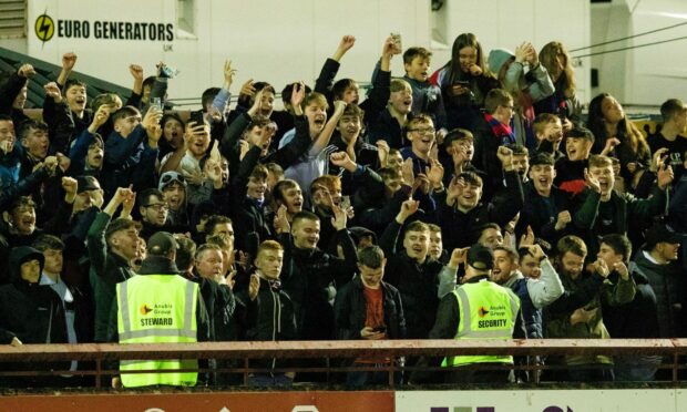 Caley Jags fans celebrate a Billy Mckay goal from the West Enclosure last season. Image: Craig Brown/SNS Group