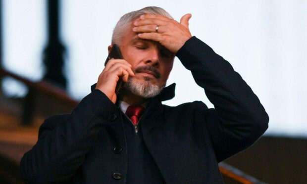 Aberdeen manager Jim Goodwin in the stands during the 4-0 loss at Dundee United.