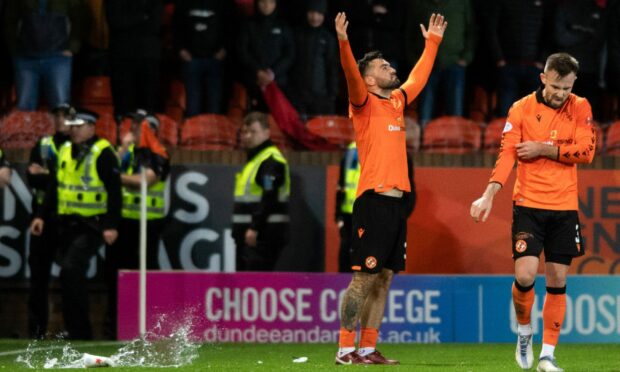 Dundee United's Tony Watt celebrates as he makes it 2-0 against Aberdeen.