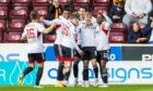 Aberdeen's Bojan Miovski celebrates making it 1-0 against Motherwell.