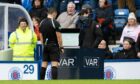 Referee Nick Walsh checks the VAR monitor for a handball in the box by Aberdeen's Jayden Richardson. Image: Alan Harvey/SNS