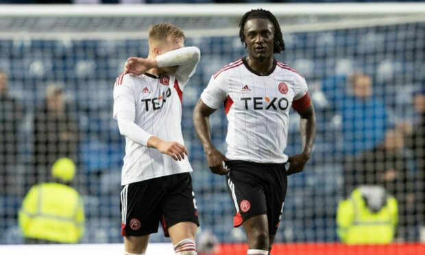 Aberdeen' Anthony Stewart looks dejected at full-time after losing 4-1 at Rangers.