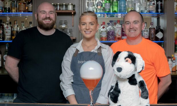 From left: Gregor Sey from Aberdeen Cocktail Week, Ellie Cook from Barbelow and Adam Simpson from Charlie House with 'The Charlie Dog' cocktail.
