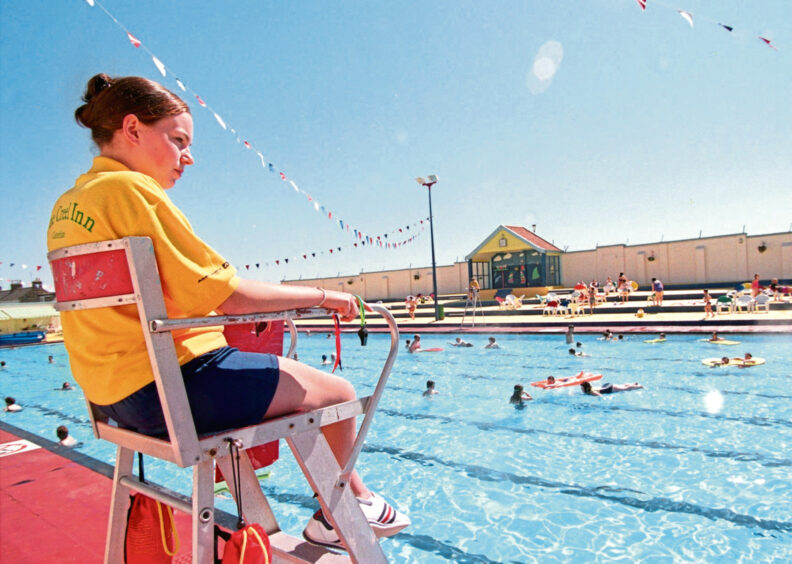 Lifeguard Sarah Hales watching out at the first day of the season for the Stonehaven swimming pool.