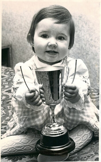 1978 - The winner of Section I Bonny Baby prize Gayle Stewart from Banchory.