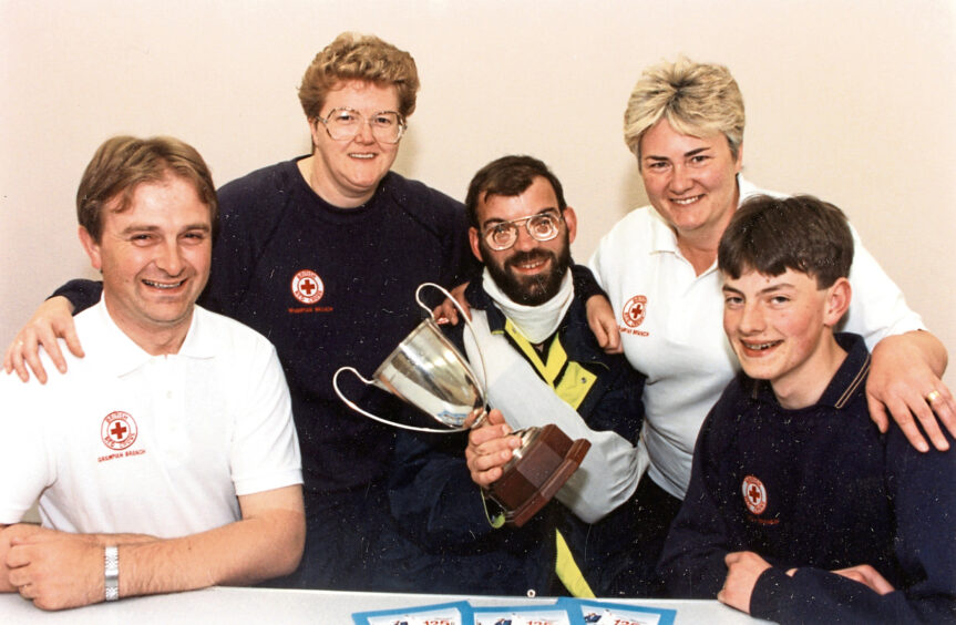 1996 - Tom McDonald, Margaret Buchan, Roddy Hayes, Mary Thomason, Andrew Innes with their Scottish first aid championships trophy.