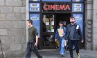 Staff members, including Dillan-James Carter on the right, leave the Belmont Filmhouse earlier today. Picture by Chris Sumner/DCT Media