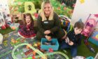 Family support officer Sarah Anderson with twins Holly and Jack Shepherd, both 4. Image: Chris Sumner/ DC Thomson