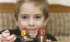 Ross McKenzie, 6, takes part in a sweetie survey in 1994.