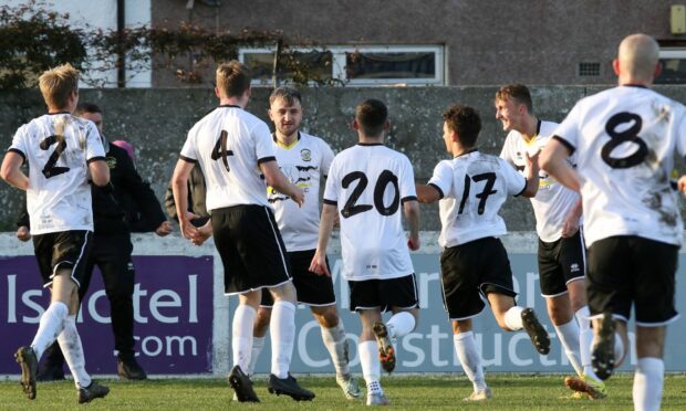 Clachnacuddin players celebrate their winning goal against Lossiemouth which was scored by Paul Brindle, third from left