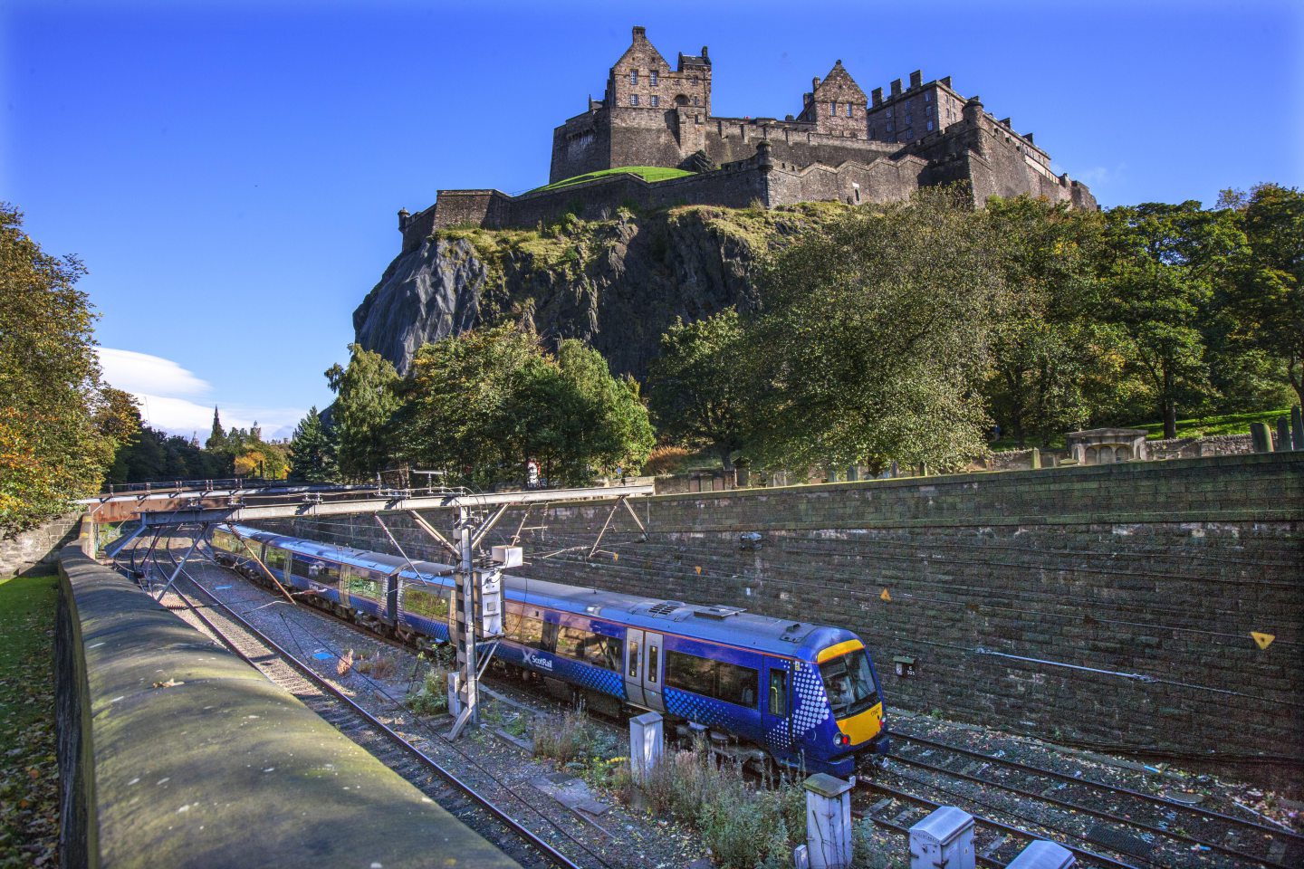 ScotRail train passes Edinburgh Castle