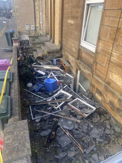 bits of roof and rubble from fire